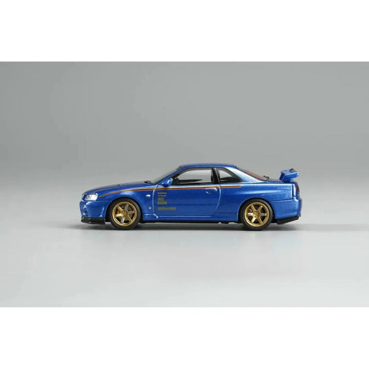 MotorHelix - Nissan Skyline GT-R (R34) (Customized Bayside Blue) (Hong Kong Toy Car Salon 2026) 1/64 Scale Diecast Model Car (M63453DZ-PT)