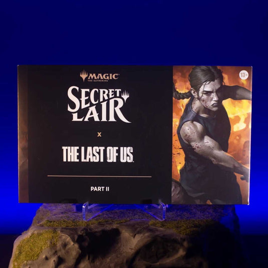 MTG - The PlayStation Super Drop - Secret Lair X The Last of Us Part I Ages Three and Up MTG - The PlayStation Super Drop - Secret Lair X The Last of Us Part I Ages Three and Up